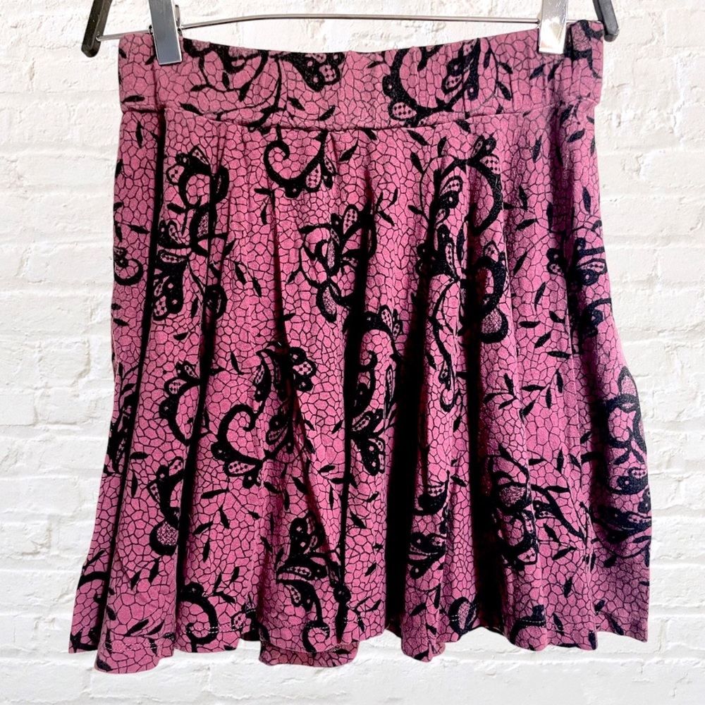 Pins & Needles casual mini skirt. Purple plum + black floral lace pattern. Small
